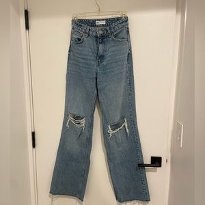 Zara wide leg high wasted jeans with raw hem and cuts at the knee